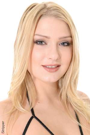 Stripper Picture of Lucy Heart - Lucy Heart is yet another gorgeous blonde to join the Desk Babes team. Straight out of Russia Lucy has one of the biggest sex drives that we have ever seen in a model. Lucy loves sex and she has a lot of it. She hits on all the women that she works with and we have to say she's definitely got game! Models are lining up left and right to work with her so we are sure you are going to love Lucy just as much as the Desk Babes girls do!