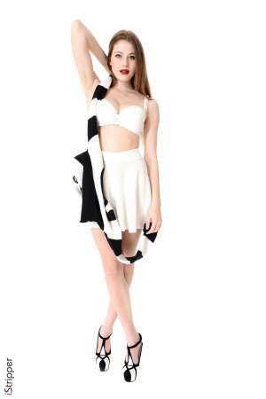 Stripper Picture of Heidi Romanova - Heidi Romanova is the very definition of sexy. This twenty year old beauty from Latvia is a former hairdresser that went to a burlesque show with friends and got hooked on the art of stripping. She studied the history of stripping and burlesque for over a year before she decided to take the stage herself to give her first performance. It was a life changing moment for Heidi and she realized that stripping is what she was meant to do. Her shows are always different and evolving as her love of the art grows. Heidi considers her fans lovers and she gives everything she has up there on the stage every single time she dances.