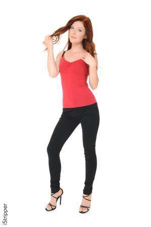 Stripper Picture of Mia Sollis - Mia Sollis is a sexy redhead that we know you are going to love. She is the kind of classy lady that makes everyone feel good when they talk with her. Mia is a self proclaimed people person and she believes it is what makes her striptease performances so special. Mia really connects with her fans and enjoys providing one on one real girlfriend experiences. So connect with Mia and download all her erotic escapades.