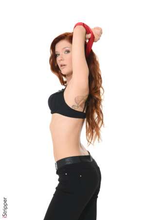 Stripper Picture of Mia Sollis - Mia Sollis is a sexy redhead that we know you are going to love. She is the kind of classy lady that makes everyone feel good when they talk with her. Mia is a self proclaimed people person and she believes it is what makes her striptease performances so special. Mia really connects with her fans and enjoys providing one on one real girlfriend experiences. So connect with Mia and download all her erotic escapades.