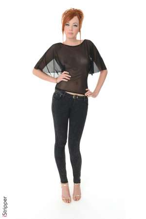 Stripper Picture of Elen Moore - The world loves a red head and we are proud to bring you Elen Moore with her fire engine red hair and her curvaceous body! Elen just graduated from University but she is taking time off to dance and travel the world! Elen is a free spirit at heart and she loves exploring all aspects of her sexuality. Elen has traveled to more than 20 countries and she is proud to say she has had a lover in each and every one! Bisexual and outgoing Elen is a true exhibitionist and she can't wait to perform for you!