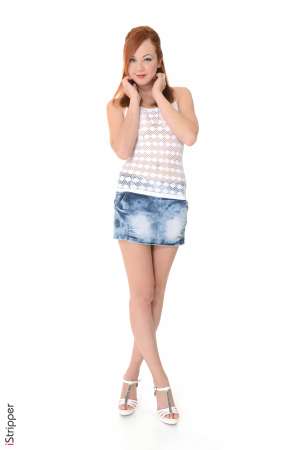 Stripper Picture of Elen Moore - The world loves a red head and we are proud to bring you Elen Moore with her fire engine red hair and her curvaceous body! Elen just graduated from University but she is taking time off to dance and travel the world! Elen is a free spirit at heart and she loves exploring all aspects of her sexuality. Elen has traveled to more than 20 countries and she is proud to say she has had a lover in each and every one! Bisexual and outgoing Elen is a true exhibitionist and she can't wait to perform for you!