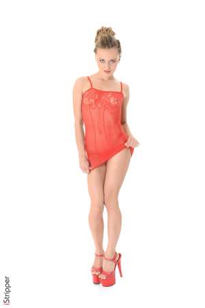 Stripper Picture of Foxy - She may be petite and have tiny tits but Foxy is full on attitude. This tiny diva is only 23 years old but she knows what she wants out of life and she goes after it. Dancing since she turned 19 Foxy wanted to be one of the best in the business and sure enough she now has fans the world over. When she isn't dancing on stage Foxy is busy researching new investments for her entrepreneurial endeavors. A shrewd business woman she wants to be retired and living on a tropical island by 40 and we think she has more than enough moxie to do it!