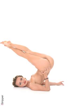 Stripper Picture of Foxy - She may be petite and have tiny tits but Foxy is full on attitude. This tiny diva is only 23 years old but she knows what she wants out of life and she goes after it. Dancing since she turned 19 Foxy wanted to be one of the best in the business and sure enough she now has fans the world over. When she isn't dancing on stage Foxy is busy researching new investments for her entrepreneurial endeavors. A shrewd business woman she wants to be retired and living on a tropical island by 40 and we think she has more than enough moxie to do it!