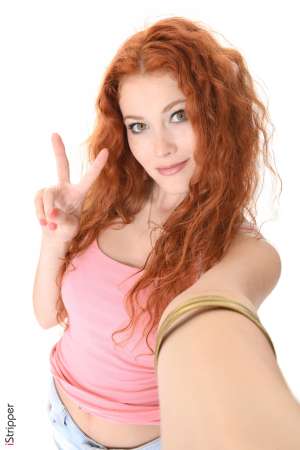 Stripper Picture of Heidi Romanova - Heidi Romanova is the very definition of sexy. This twenty year old beauty from Latvia is a former hairdresser that went to a burlesque show with friends and got hooked on the art of stripping. She studied the history of stripping and burlesque for over a year before she decided to take the stage herself to give her first performance. It was a life changing moment for Heidi and she realized that stripping is what she was meant to do. Her shows are always different and evolving as her love of the art grows. Heidi considers her fans lovers and she gives everything she has up there on the stage every single time she dances.