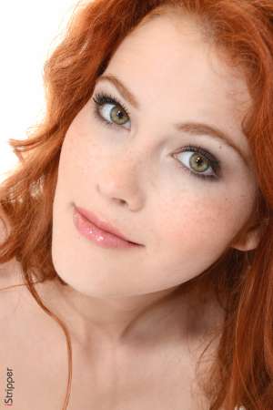 Stripper Picture of Heidi Romanova - Heidi Romanova is the very definition of sexy. This twenty year old beauty from Latvia is a former hairdresser that went to a burlesque show with friends and got hooked on the art of stripping. She studied the history of stripping and burlesque for over a year before she decided to take the stage herself to give her first performance. It was a life changing moment for Heidi and she realized that stripping is what she was meant to do. Her shows are always different and evolving as her love of the art grows. Heidi considers her fans lovers and she gives everything she has up there on the stage every single time she dances.