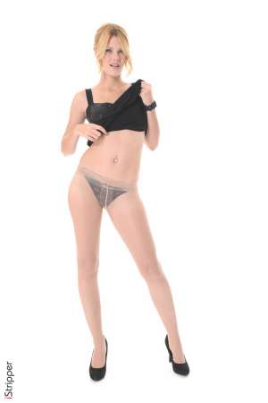 Stripper Picture of Izzy - Izzy is a beautiful blonde that is relatively new to stripping. One night she went out with a bunch of friends to a strip club and after receiving her first lap dance she knew she wanted to be that beautiful babe in control on stage and turning the entire room on. As it turns out Izzy was a classically trained dancer growing up so she felt very comfortable dancing and moving her body around on stage. The very next night she went back auditioned and got the job! Now she is here dancing for you. When she isn't on stage Izzy is a self proclaimed home body. She enjoys cooking and spending weekends snuggled in bed with a good book and a lover or two!