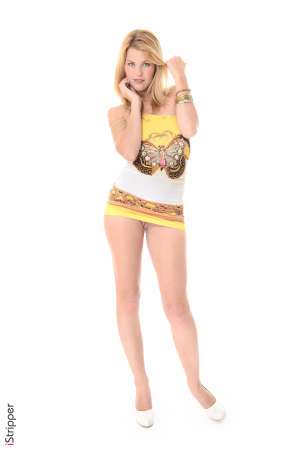 Stripper Picture of Izzy - Izzy is a beautiful blonde that is relatively new to stripping. One night she went out with a bunch of friends to a strip club and after receiving her first lap dance she knew she wanted to be that beautiful babe in control on stage and turning the entire room on. As it turns out Izzy was a classically trained dancer growing up so she felt very comfortable dancing and moving her body around on stage. The very next night she went back auditioned and got the job! Now she is here dancing for you. When she isn't on stage Izzy is a self proclaimed home body. She enjoys cooking and spending weekends snuggled in bed with a good book and a lover or two!