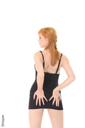 Stripper Picture of Anny Aurora - Red heads rule and Anny Aurora is ready to show you why. Sexy sassy and sultry this vixen knew from the first time she stepped into a strip club that she wanted to be the hot babe on stage performing for the crowds. Anny tells us that she gets an amazing sexual charge every time she struts out to put on a show. Anny considers herself polyamorous and always has more than one lover on hand to play with. When she's not enjoying a morning filled with snuggling Anny enjoys traveling reading her fan mail and designing lingerie. She hopes to create her own sexy panty line some day.