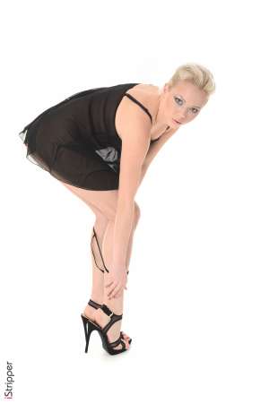 Stripper Picture of Tricia Teen - Tricia is a nineteen-year-old blonde beauty from Budapest Hungary. Tricia is a kind and caring person which made her decide to pursue a career in nursing. But University is expensive and the lovely Tricia needed a way to pay for her studies. She started modeling nude for art students and found it thrilling to be naked in front of a crowd. Tricia expanded her repertoire to include wet t-shirt contests (which she won) and finally exotic dancing. Be sure to get a front row seat when this beauty takes the stage because she burns up the dance floor like no other! When Tricia isn't dancing or studying for her boards she enjoys going out to eat with friends and watching classic black and white movies in her pajamas with a bowl of popcorn.