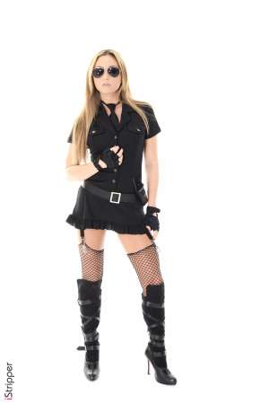 Stripper Picture of Natalia - All the way from across the sea meet Natalia. An English girl Natalia has quiet grace and refinement as well as a seductive wild side that she regularly sets free during her exciting on stage performances. Watch Natalia sizzle in a variety of sensual outfits that truly accentuate her scrumptious all natural curves.