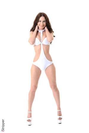 Stripper Picture of Lana Rey - Lana Rey likes to be naked so pursuing a career in the erotic arts was a given for this sexy Russian brunette. She has always loved the feeling of freedom that comes from being unencumbered by clothes and the fact that her fans watch her strip them off is a bonus! Lana is a total exhibitionist but what she really loves is feeling sexy and seductive. She enjoys lingerie shopping and keeping her collection fresh so she can surprise her lovers with cut outfits in bed at every opportunity. When she's not working Lana enjoys cooking healthy organic meals and entertaining with friends.