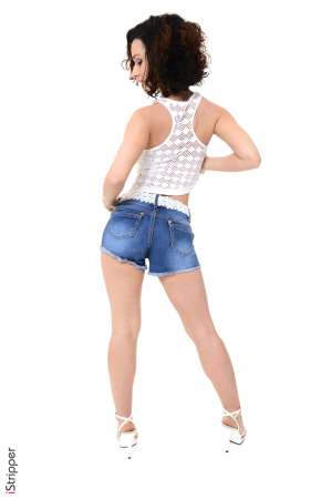 Stripper Picture of Pammie Lee - Love a woman with dark hair tattoos and big tits? Then be sure to catch every dance that Pammie Lee puts down. This 24 year old babe from Russia loves performing for the camera. Pammie was studying acting at University when she first started dancing at clubs to make a bit of extra money. The attention she got went straight to her head (and loins) as Pammie discovered that grinding around on stage got her horny! Wanting to explore her exhibitionist side more Pammie tried her hand at stripping and the rest is history! Now we are thrilled to feature her here on VirtuaGirl. When she's not on stage Pammie enjoys watching classic black and white movies at home while snuggling. She also enjoys date nights that include taking in the latest theatre productions and a nice nightcap before heading home to get in bed and play!