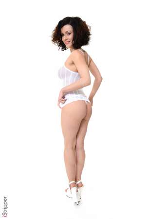 Stripper Picture of Pammie Lee - Love a woman with dark hair tattoos and big tits? Then be sure to catch every dance that Pammie Lee puts down. This 24 year old babe from Russia loves performing for the camera. Pammie was studying acting at University when she first started dancing at clubs to make a bit of extra money. The attention she got went straight to her head (and loins) as Pammie discovered that grinding around on stage got her horny! Wanting to explore her exhibitionist side more Pammie tried her hand at stripping and the rest is history! Now we are thrilled to feature her here on VirtuaGirl. When she's not on stage Pammie enjoys watching classic black and white movies at home while snuggling. She also enjoys date nights that include taking in the latest theatre productions and a nice nightcap before heading home to get in bed and play!