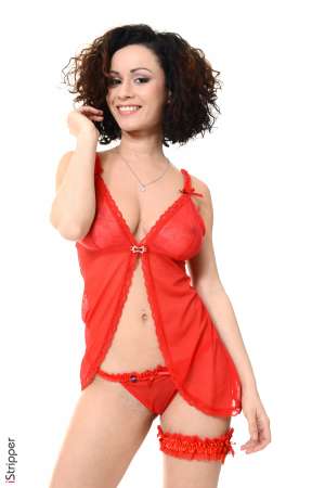 Stripper Picture of Pammie Lee - Love a woman with dark hair tattoos and big tits? Then be sure to catch every dance that Pammie Lee puts down. This 24 year old babe from Russia loves performing for the camera. Pammie was studying acting at University when she first started dancing at clubs to make a bit of extra money. The attention she got went straight to her head (and loins) as Pammie discovered that grinding around on stage got her horny! Wanting to explore her exhibitionist side more Pammie tried her hand at stripping and the rest is history! Now we are thrilled to feature her here on VirtuaGirl. When she's not on stage Pammie enjoys watching classic black and white movies at home while snuggling. She also enjoys date nights that include taking in the latest theatre productions and a nice nightcap before heading home to get in bed and play!