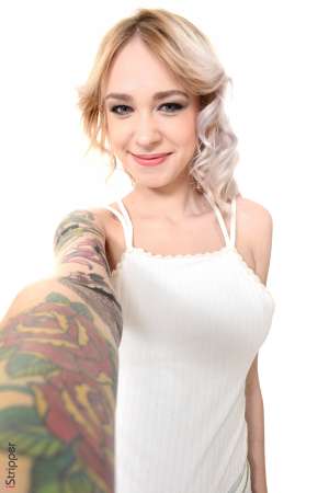 Stripper Picture of Arteya - Arteya is a 21 year old blonde beauty from Russia and she is beyond excited to be making her debut here. It may be hard to believe but Arteya describes herself as shy and introverted when she's not on stage. For that reason Arteya loves when fans come up and introduce themselves to her because it breaks the ice. But the second she hits that stage it's a different story. Arteya definitely gets off on performing for a crowd. It makes her feel sexy and horny all at the same time. In her personal life Arteya giggles as she tells us she loves foot play. She has a bit of a foot fetish and she always makes sure her toes are on point just in case someone wants to suckle on them!