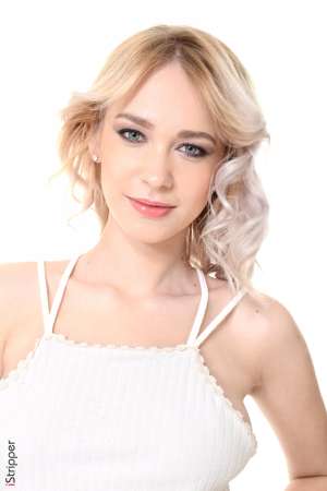 Stripper Picture of Arteya - Arteya is a 21 year old blonde beauty from Russia and she is beyond excited to be making her debut here. It may be hard to believe but Arteya describes herself as shy and introverted when she's not on stage. For that reason Arteya loves when fans come up and introduce themselves to her because it breaks the ice. But the second she hits that stage it's a different story. Arteya definitely gets off on performing for a crowd. It makes her feel sexy and horny all at the same time. In her personal life Arteya giggles as she tells us she loves foot play. She has a bit of a foot fetish and she always makes sure her toes are on point just in case someone wants to suckle on them!