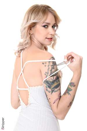 Stripper Picture of Arteya - Arteya is a 21 year old blonde beauty from Russia and she is beyond excited to be making her debut here. It may be hard to believe but Arteya describes herself as shy and introverted when she's not on stage. For that reason Arteya loves when fans come up and introduce themselves to her because it breaks the ice. But the second she hits that stage it's a different story. Arteya definitely gets off on performing for a crowd. It makes her feel sexy and horny all at the same time. In her personal life Arteya giggles as she tells us she loves foot play. She has a bit of a foot fetish and she always makes sure her toes are on point just in case someone wants to suckle on them!