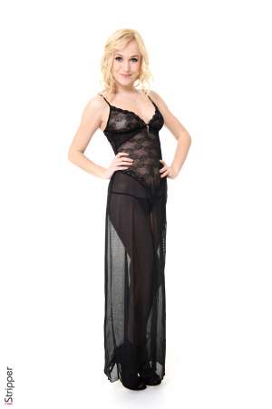 Stripper Picture of Aislin - Aislin is a pretty 21-year-old blonde from Kiev Ukraine. She went to her first strip club with a bunch of friends a little over a year ago where someone bought her a lap dance. Having a beautiful diva throw her arms around her neck and start grinding her hips on her was enough to make Aislin realize she too wanted to turn people on in that way. Aislin knew she knew how to move her hips in bed but she enrolled in pole dancing lessons to learn the finer points of dancing and performing on stage. The rest is history and now she is a feature dancer with dedicated fans all over the world. When she's not performing on stage Aislin says she tends to be a homebody. She loves snuggling up on her couch with a good book and a cozy blanket. She also practices yoga twice a week and likes to try and cook different foods from around the world. She says tries because some have been wild successes and others not so much! We know you are going to love Aislin so keep an eye out for this up and coming star!