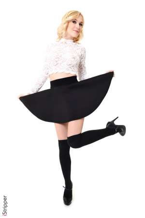 Stripper Picture of Aislin - Aislin is a pretty 21-year-old blonde from Kiev Ukraine. She went to her first strip club with a bunch of friends a little over a year ago where someone bought her a lap dance. Having a beautiful diva throw her arms around her neck and start grinding her hips on her was enough to make Aislin realize she too wanted to turn people on in that way. Aislin knew she knew how to move her hips in bed but she enrolled in pole dancing lessons to learn the finer points of dancing and performing on stage. The rest is history and now she is a feature dancer with dedicated fans all over the world. When she's not performing on stage Aislin says she tends to be a homebody. She loves snuggling up on her couch with a good book and a cozy blanket. She also practices yoga twice a week and likes to try and cook different foods from around the world. She says tries because some have been wild successes and others not so much! We know you are going to love Aislin so keep an eye out for this up and coming star!