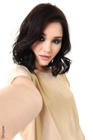 Stripper Picture of Malena Fendi - Malena Fendi is a total diva. She may only be 23 years old but she is 100% addicted to the finer things in life. Expensive cars French lingerie VIP service at designer boutiques and dining at the most exclusive restaurants are all a part of her lavish lifestyle. Malena has danced her way to the top and she's not about to stop or slow down. She believes that if you treat yourself like a beautiful princess the riches are sure to follow and so far she has been right! Malena likes for her lovers to be above all else confident. She finds confidence incredibly sexy and in return you can expect her to make you proud to have her on your arm. She is always impeccably dressed and ready to turn heads and tonight she is all yours!