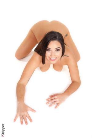 Stripper Picture of Karlee Grey - Many of you probably recognize those long legs that sexy thigh tattoo and those big boobs as belonging to Karlee Grey the porn star and you would be right! We are stoked to have Karlee taking time out of her busy shooting schedule to dance for you here with us. Bodies don't get more perfect than Karlee's and now she is going to show off every inch of it for you in her private stage shows! Karlee started out as a stripper before migrating into porn so performing like this is taking it back old school for her and she couldn't be happier. She's always loved to dance and combining that love with her exhibitionist nature still gets her off today. When Karlee isn't dancing for us she is typically making XXX movies. Her busy schedule doesn't allow much down time and for that reason she likes to spend quiet nights home with friends or lovers. If she has off for a few days in a row Karlee enjoys partying in Vegas or hitting the local LA club scene with friends. Karlee owns the stage every time she takes it. Her dances are powerful and intensely sexy so be sure to check out each and every one!