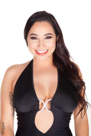 Stripper Picture of Karlee Grey - Many of you probably recognize those long legs that sexy thigh tattoo and those big boobs as belonging to Karlee Grey the porn star and you would be right! We are stoked to have Karlee taking time out of her busy shooting schedule to dance for you here with us. Bodies don't get more perfect than Karlee's and now she is going to show off every inch of it for you in her private stage shows! Karlee started out as a stripper before migrating into porn so performing like this is taking it back old school for her and she couldn't be happier. She's always loved to dance and combining that love with her exhibitionist nature still gets her off today. When Karlee isn't dancing for us she is typically making XXX movies. Her busy schedule doesn't allow much down time and for that reason she likes to spend quiet nights home with friends or lovers. If she has off for a few days in a row Karlee enjoys partying in Vegas or hitting the local LA club scene with friends. Karlee owns the stage every time she takes it. Her dances are powerful and intensely sexy so be sure to check out each and every one!