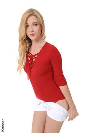 Stripper Picture of Genevieve Gandi - Genevieve Gandi is making her Diva debut with us and we know you are going to love what she's putting out there. This 23-year-old blonde beauty from Russia is a sexy bombshell that prides herself on being a total exhibitionist. Genevieve loves to be in the spotlight always. Whether she is out with friends at a club or performing on stage she likes all eyes to be on her. She is a true performer and she tells us that stripping is the perfect profession for her. Genevieve has always liked to be in the spotlight. She grew up performing for anyone who would watch and actually considered going to University for the performing arts. But a dirty dancing competition got in the way of that. While away on Holiday Genevieve joined the competition with a girlfriend and won! As she left the stage a club owner in the audience told her she should think about dancing professionally and a new career was born! Like any 23-year-old hottie Genevieve lives very much in the now. She considers herself a bit of a party-girl and still enjoys staying out until the sun comes up hitting all the hot clubs. She also enjoys traveling with friends dancing obviously shopping and role playing in bed!