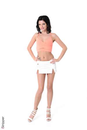 Stripper Picture of Monika Benz - Monika Benz is a 26-year-old Czech beauty that is making her iStripper debut. If you love petite dark haired beauties with tiny tits and tattoos Monika is a dancer you are going to want to pay attention to! Monika tells us that she is naturally petite and that she really doesn't have to work too hard at staying skinny. In fact Monika's friends often tease her about how much she eats! She tells us that she isn't the kind of girl that goes on a date with a guy and orders a salad. Quite the opposite in fact! Monika's favorite food is Indian and she tells us that she can eat rather impressive amounts of it. In her spare time Monika loves dating. She tells us that she is a serial dater and enjoys meeting new people. She is addicted to the 