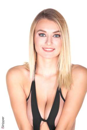 Stripper Picture of Natalia Starr - If you think you recognize Natalia Starr you probably do! She is a world famous pornstar and we are very excited to have her dancing here for us. But not as excited as you will be after you see what she can do on the stage! Natalia is 110% comfortable with her body and she loves to show it off. That means you are going to get top notch sexy stripteases from her every time she hits the stage and then some! Natalia lives to turn her fans on. She gets a huge rush knowing men and women are at home watching her get off. The same goes for when she strips. Natalia is a true exhibitionist and she loves to perform for her fans. She is super stoked to be able to give you intimate one on one performances where she is dancing for you and only you. Natalia keeps a very busy schedule but when she finds the time to go out she says she is just your average girl! She totally loves shopping with her girlfriends and she also takes advantage of the LA nightlife when she can. She's gotten used to the VIP treatment in the clubs but she still likes to get out onto the dance floor and go wild with her girlfriends.