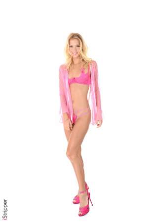 Stripper Picture of Kristina - WARNING! Kristina is a real BOMB! A sublime blonde with smooth silky hair. Her freshness and sensuality are matched only by the perfection of her small firm body! She loves to play with the camera and with your nerves! In life Kristina looooove to dance she visites the most beautiful dance floors in all the countries where her shootings bring her and leaves no one indifferent! A MUST for your collection!