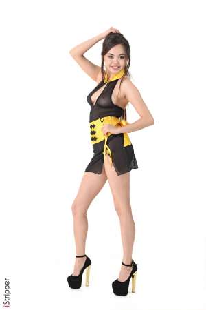 Stripper Picture of Li Moon - Caution! This girl is dangerous! Li Moon is a young beauty of 22 years old. Her asian origins gives to her beauty some magics and her personnality increases again the sensualism she gives off. She has a very tiny body with the smallest feet we ever seen! Her enthusiasm and freshness are a real breath of fresh air! No hesitation get her shows you won't regret it!