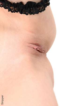 Stripper Picture of Debora A - Debora is born 22 years ago in Ukrania. Black long hair brown smily eyes a rose on upper left thigh. Debora starts to get a really great notoriety and she enchants all the photographers she has worked with including us! Apart from her modeling career she plays the drums and would like to become Director of Video Clips. She loves acting and whatever outfit she wears she's just perfect in it! Working girl pink teen sensual goddess her shows with iStripper are all fantastic!