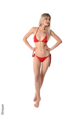 Stripper Picture of Eva Sugar - Eva Sugar is a young blond beauty born in Ukraine in 1998. She's very new to the adult modeling and we are among the first ones to have the chance to film her! She has a delicate tatoo above her breast that says 