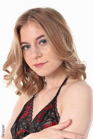 Stripper Picture of Shayla - Shayla is just 21 she comes from Ukraine and is very new to the adult modeling. She's a shy slim beauty with a soft skin and touching poses. Shayla dreams of moving to the United States. She plays the piano and drums and spend most of her free time at home in comfortable pyjamas playing music and hugging her dogs...