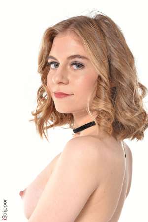 Stripper Picture of Shayla - Shayla is just 21 she comes from Ukraine and is very new to the adult modeling. She's a shy slim beauty with a soft skin and touching poses. Shayla dreams of moving to the United States. She plays the piano and drums and spend most of her free time at home in comfortable pyjamas playing music and hugging her dogs...