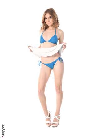 Stripper Picture of Shayla - Shayla is just 21 she comes from Ukraine and is very new to the adult modeling. She's a shy slim beauty with a soft skin and touching poses. Shayla dreams of moving to the United States. She plays the piano and drums and spend most of her free time at home in comfortable pyjamas playing music and hugging her dogs...