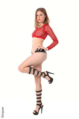 Stripper Picture of Shayla - Shayla is just 21 she comes from Ukraine and is very new to the adult modeling. She's a shy slim beauty with a soft skin and touching poses. Shayla dreams of moving to the United States. She plays the piano and drums and spend most of her free time at home in comfortable pyjamas playing music and hugging her dogs...