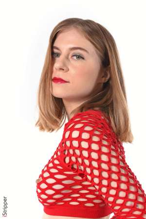 Stripper Picture of Shayla - Shayla is just 21 she comes from Ukraine and is very new to the adult modeling. She's a shy slim beauty with a soft skin and touching poses. Shayla dreams of moving to the United States. She plays the piano and drums and spend most of her free time at home in comfortable pyjamas playing music and hugging her dogs...