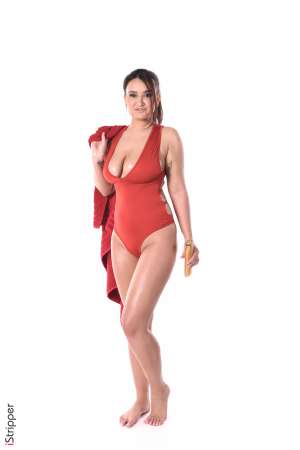 Stripper Picture of Maria Marino - Maria Marino is a beautiful brunette from Saint Petersburg where she's born 24 years ago :) She has an amazing generous body with an increbile large breast and a peach skin... Apart from modeling Maria loves painting classical music and traveling... Maria Marino came to our studios totally unshaved and offered us to shave in front of the camera! Make sure you check her show named 