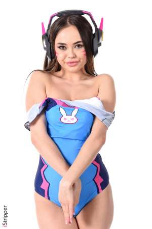 Stripper Picture of Li Moon - Caution! This girl is dangerous! Li Moon is a young beauty of 22 years old. Her asian origins gives to her beauty some magics and her personnality increases again the sensualism she gives off. She has a very tiny body with the smallest feet we ever seen! Her enthusiasm and freshness are a real breath of fresh air! No hesitation get her shows you won't regret it!