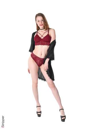 Stripper Picture of Little Candy - Here is a young redhead with a strong character! Little Candy comes from Russia where she is studying law. She began modeling in Moscow to finance her studies and became involved in the game and the pleasure of seduction .... Since then she travels all over the world - and she loves it to shoot in prestigious places. She likes to take pictures and meet new people.