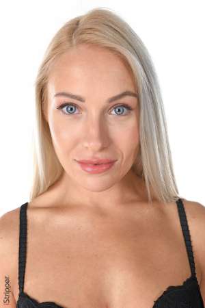 Stripper Picture of Angelika Grays - Angelika comes from Ukraine where she learnes and teaches how to strip and does a lot of yoga. She has a cute innocent face and a very sensual body! She's the kind of person who watches carefully over herself and is able to spread a lot of positive energy all around her and working with her is simply a delight.