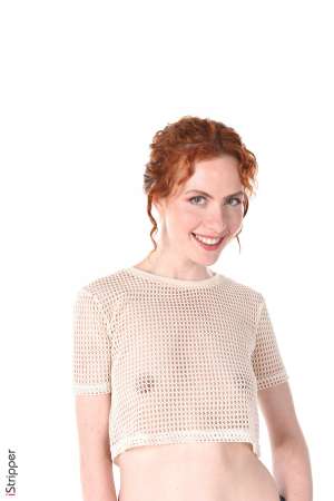 Stripper Picture of Eva Ginger - Eva Ginger is a young red head born in St Petersburg 31 years ago. She studies psychology and takes acting classes. Eva has everything we love from a red head beauty : a thin & clear skin freckles on her lovely innocent face red pubic hair (and we appreciate that she keep them!) etc. Eva is very new in the adult modeling and she has a freshness and delicacy that make her touching & totally irresistible! A must for your collection!