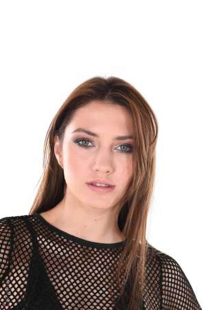 Stripper Picture of Isabelle - Here is Isabelle a very rare model that you will problably find no where else! Isabelle comes from Canada she's a natural beauty with infinite legs and long silky hair. And natural in all senses as she spends her free time riding horses fishing & surfing!