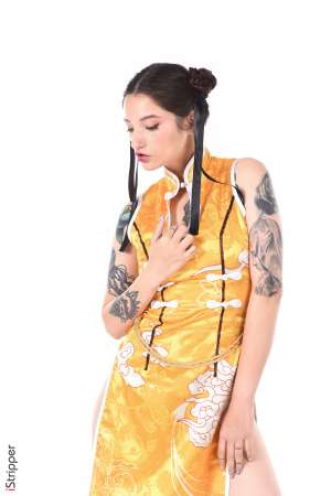 Stripper Picture of Sophie Ink - Here is Sophie Ink wonderful Russian brunette born in Moscow 27 years ago. She started her career very recently and loves exhibiting her many tatoos :) Apart from modeling Sophie likes reading classical literature and painting. She feels very close to animals and has decided to stop eating meat many years ago! She will be our Chinese new year beauty for 2020 :)