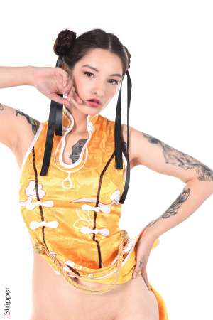 Stripper Picture of Sophie Ink - Here is Sophie Ink wonderful Russian brunette born in Moscow 27 years ago. She started her career very recently and loves exhibiting her many tatoos :) Apart from modeling Sophie likes reading classical literature and painting. She feels very close to animals and has decided to stop eating meat many years ago! She will be our Chinese new year beauty for 2020 :)