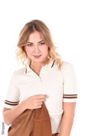 Stripper Picture of Kristina - WARNING! Kristina is a real BOMB! A sublime blonde with smooth silky hair. Her freshness and sensuality are matched only by the perfection of her small firm body! She loves to play with the camera and with your nerves! In life Kristina looooove to dance she visites the most beautiful dance floors in all the countries where her shootings bring her and leaves no one indifferent! A MUST for your collection!