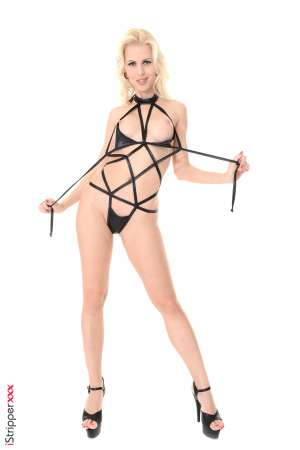 Stripper Picture of MS.Lynna - Ms.Lynna although of Swedish origin was born in the Czech Republic on 1st April 1985. Later she moved to Austria Belgium Germany Italy and United Kingdom currently lives in Slovakia. When living in London she started to attend courses of burlesque and pole-dance and this is where her hobby Striptease was born. Being naked in front of public and getting in direct contact with them without being ashamed of her body led to her being offered job for Playboy Croatia and later led her also to erotic modelling. Now you understand why she doesn't mind being topless when DJ-ing :-)