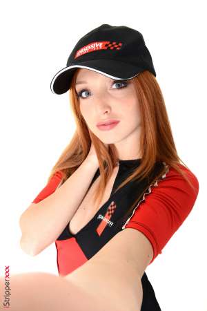 Stripper Picture of The Red Fox - Calling herself The Red Fox this beauty from the Ukraine considers herself a performance artist. Yes she is a stripper but every dance is intimate to her and she wants it to be incredibly intimate for you to watch. The Red Fox studied Art History and Acting at University which is when she started dancing erotically to pay for tuition. Soon she found it more pleasurable to dance on stage and feel the sexual energy generated by the crowd then to study from a book all day. And that is when The Red Fox was created. Now you can enjoy every curve of her body and every roll of her hip as often as you want when you download her world famous stage shows.